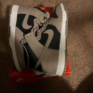 Nike Dunk High
Moon Fossil (W).   (9.5 in Men’s size)